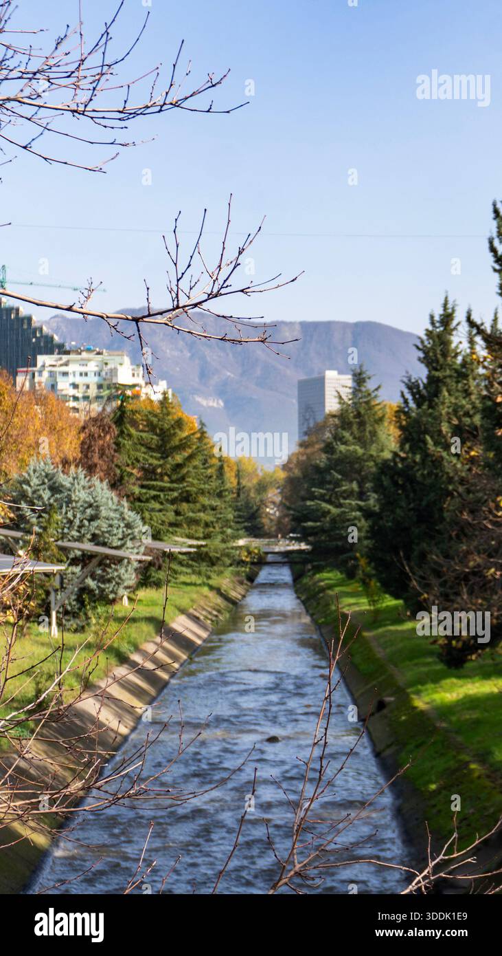 A 9:16 Portrait image of the Lana River in the centre of Tirana, Albania - Stock Image