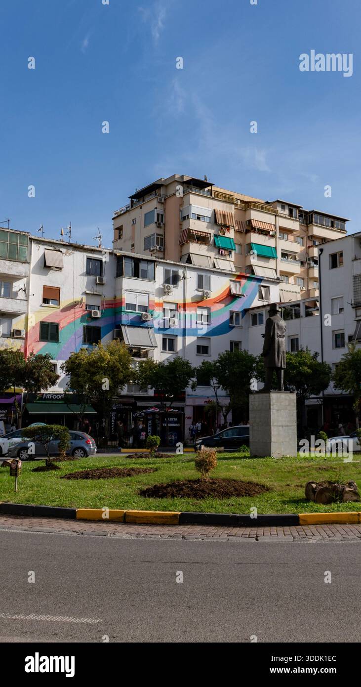 A 9:16 Portrait image of rainbow buildings in the centre of Tirana, Albania - Stock Image
