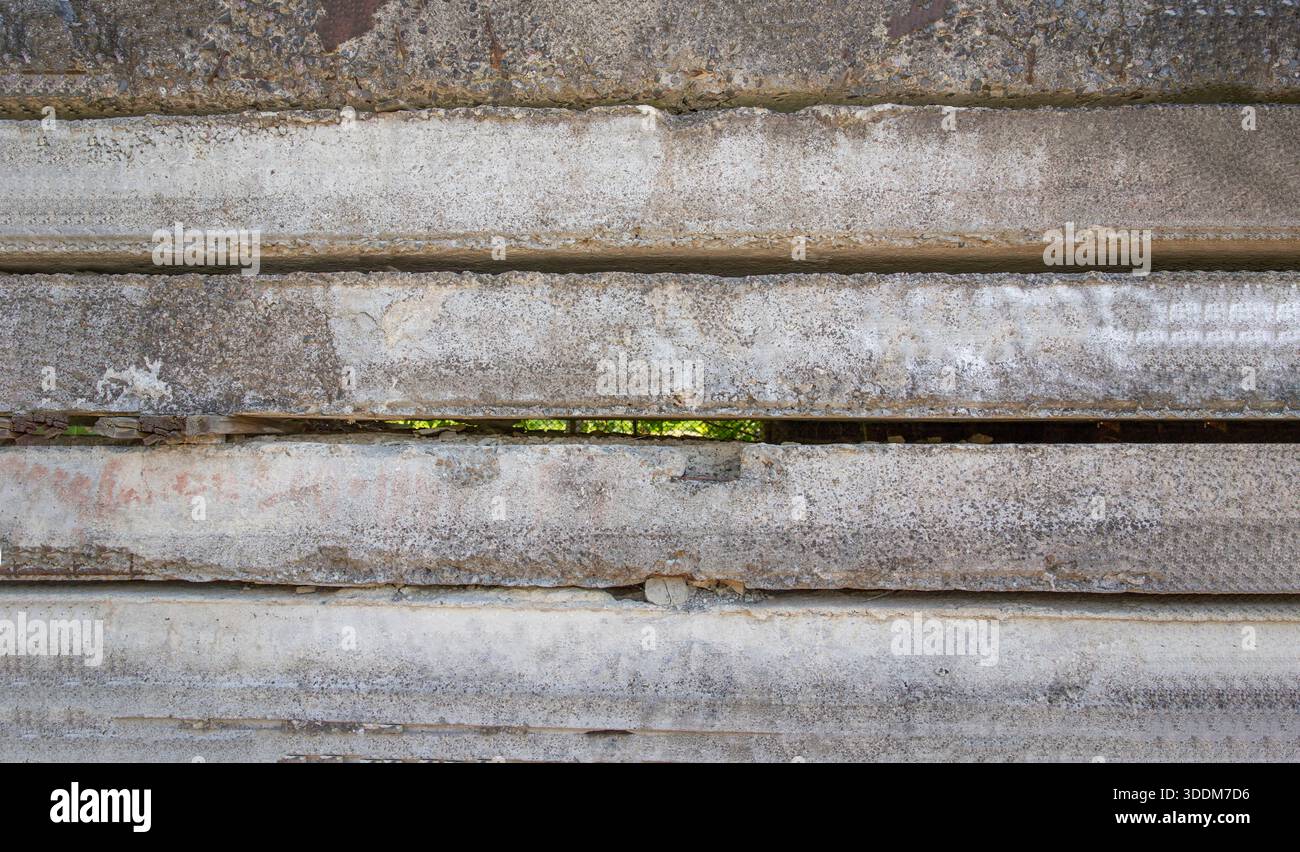 Stacked concrete slabs background with rough surface industrial texture and horizontal pattern Stock Photo