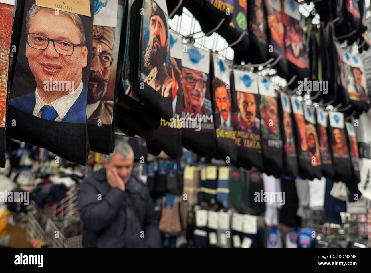 A vendor sells socks depicting Serbian President Aleksandar Vucic in an
