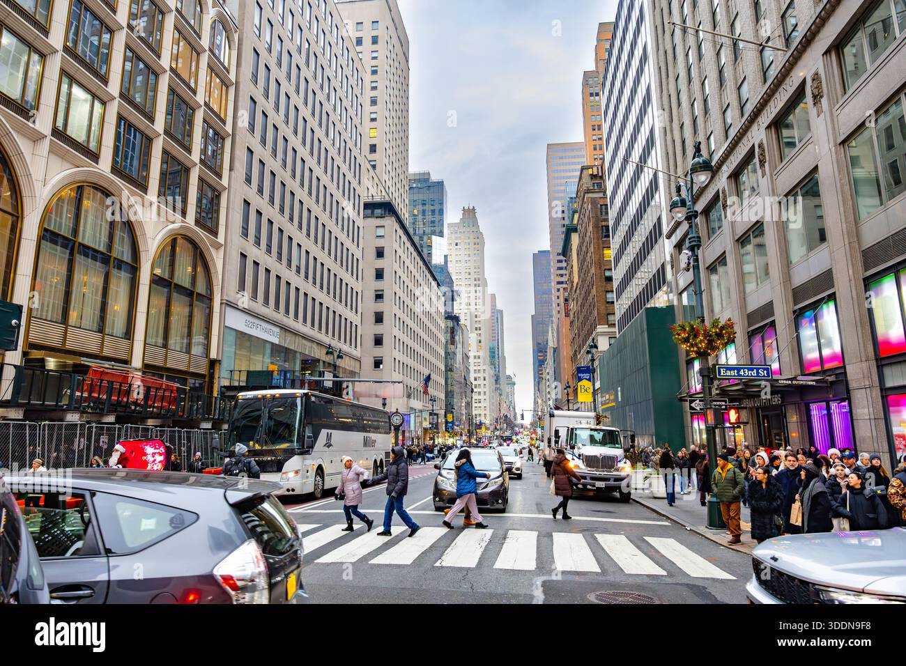 Busy Midtown Manhattan street at East 43rd Street, New York City, with ...