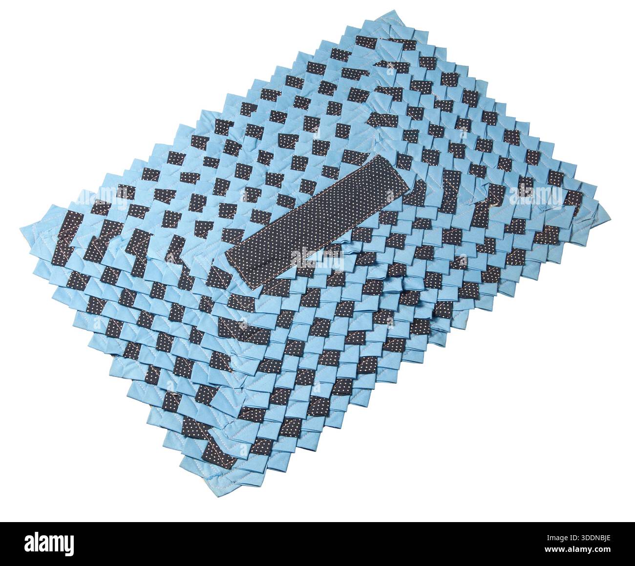 rectangular handmade patchwork fabric mat isolated white background, repeating pattern of light blue and dark blue squares cotton textile texture Stock Photo