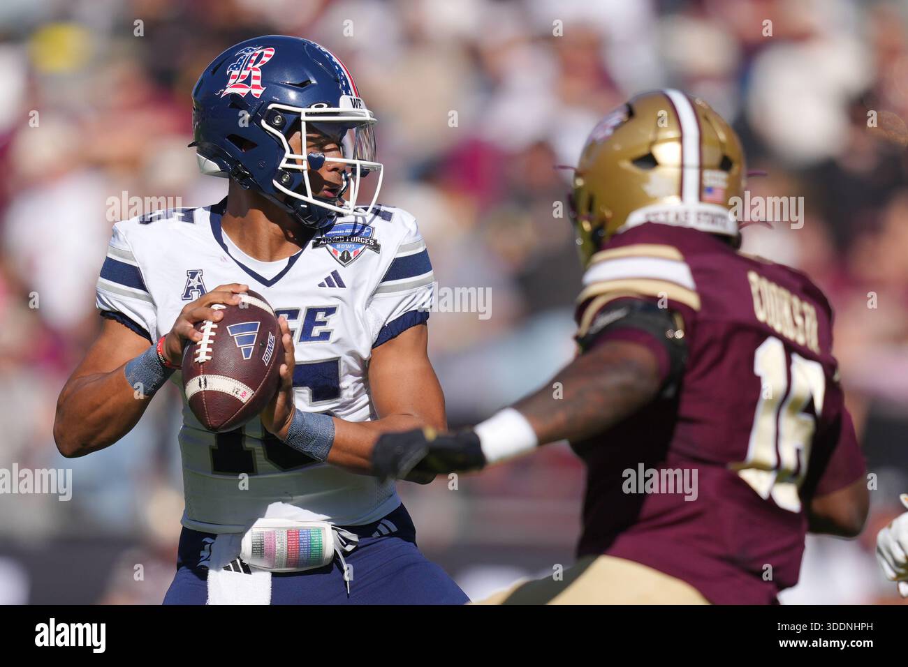Rice quarterback Patrick Crayton Jr., left, looks to pass as Texas ...