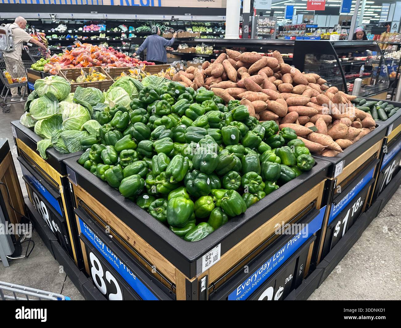 General view of Walmart fruits and vegetables to include signage at the ...