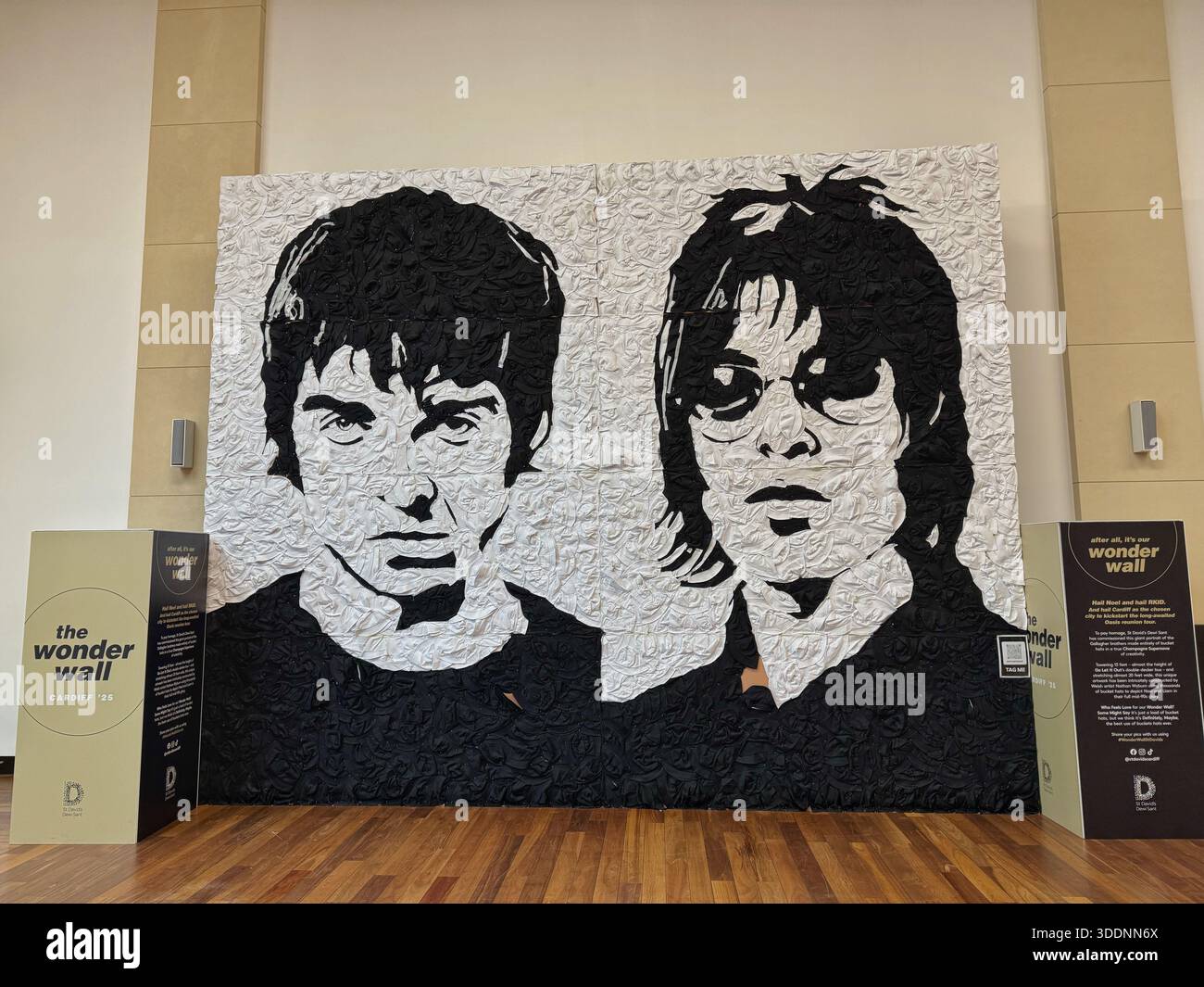 Hail Noel and hail RKID portrait in Cardiff, made of bucket hats, to commemorate the start of the OASIS reunion tour, 2025. - Smartphone Captured Stock Image