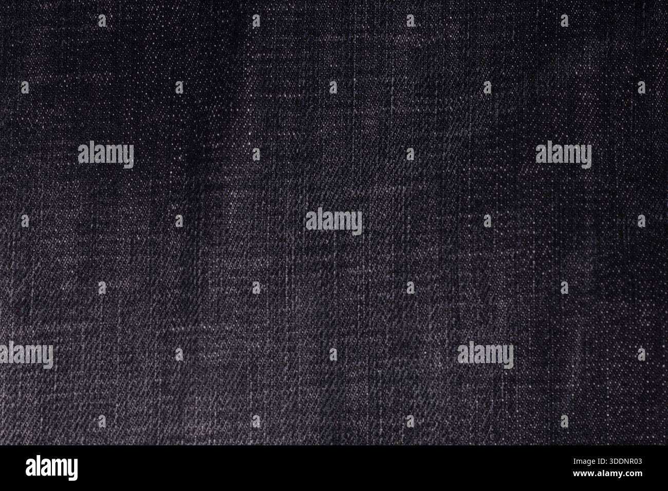 Texture of Black Washed Denim Fabric Stock Photo