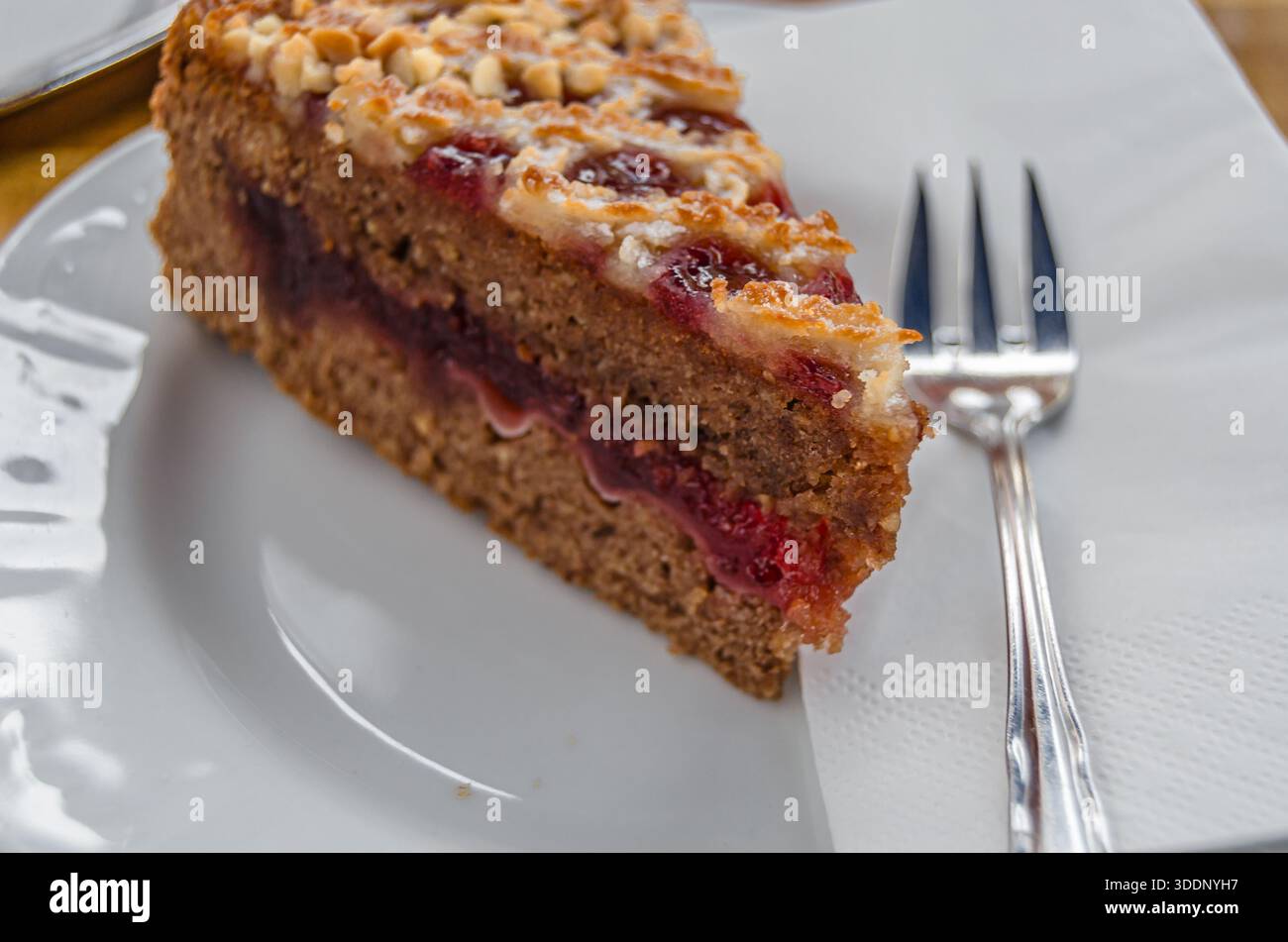 Linzer Form A slice of Linzer Torte (Linzer tart), a traditional Austrian pastry, a ...