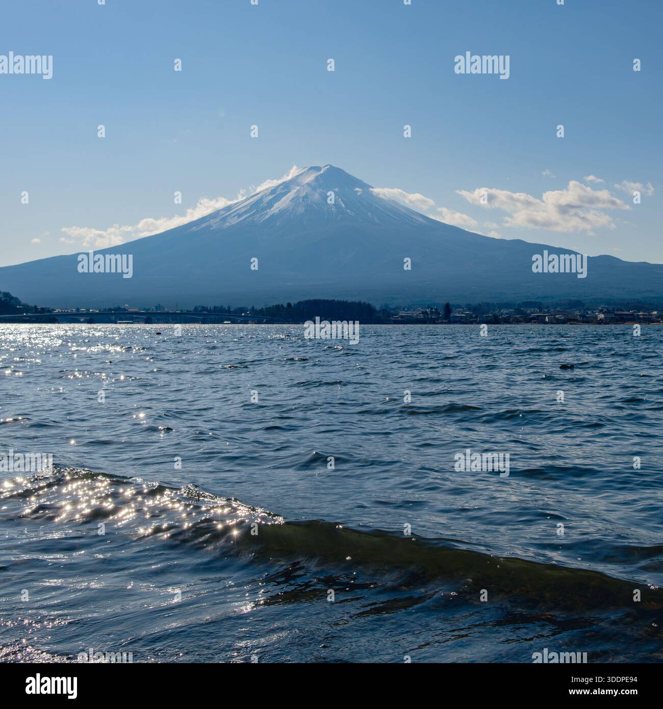 Mt. Fuji from the water's edge with a small ripple Stock Photo