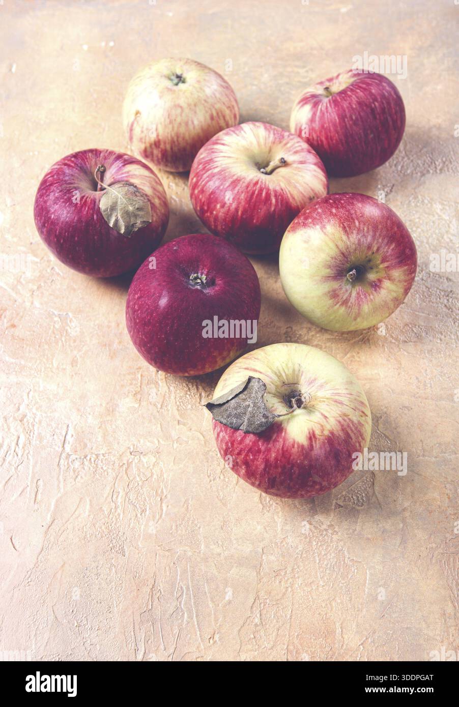 Apples scattered on the table, selective focus, yellow - red, summer variety, early, no people Stock Photo
