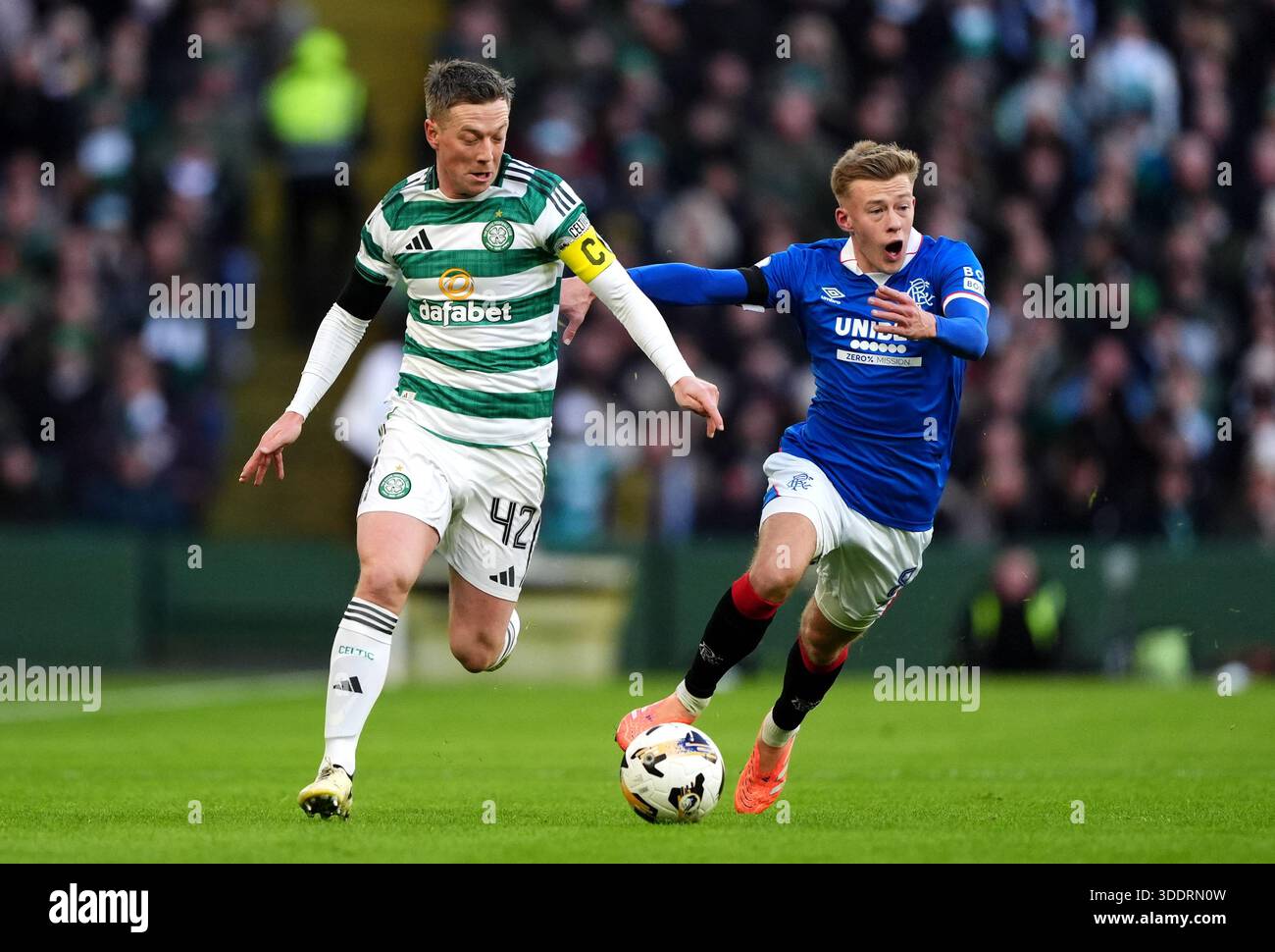 Celtic's Callum McGregor (left) and Rangers' Connor Barron battle for ...