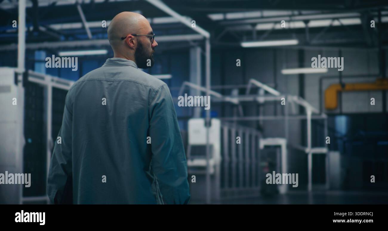 Engineer inspecting data center hall hi-res stock photography and ...