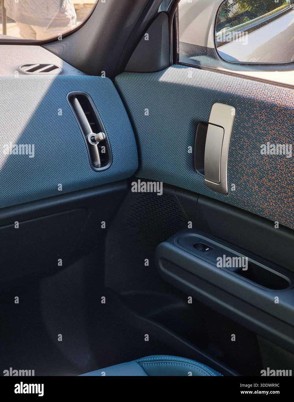 Corner of front door and front panel in a car. Interior of new compact ...
