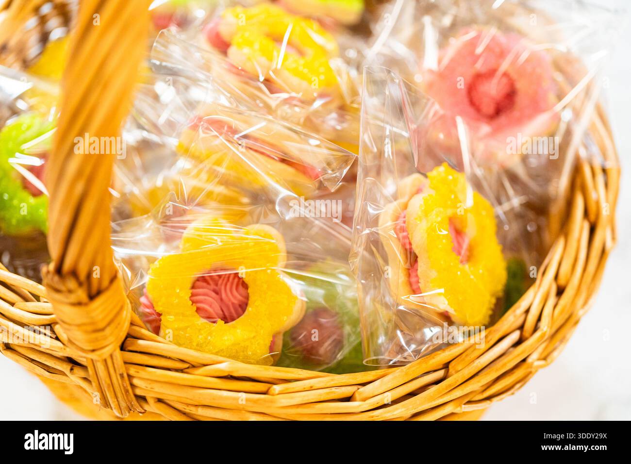 Wrapped Easter Cookie Sandwiches in Basket Stock Photo