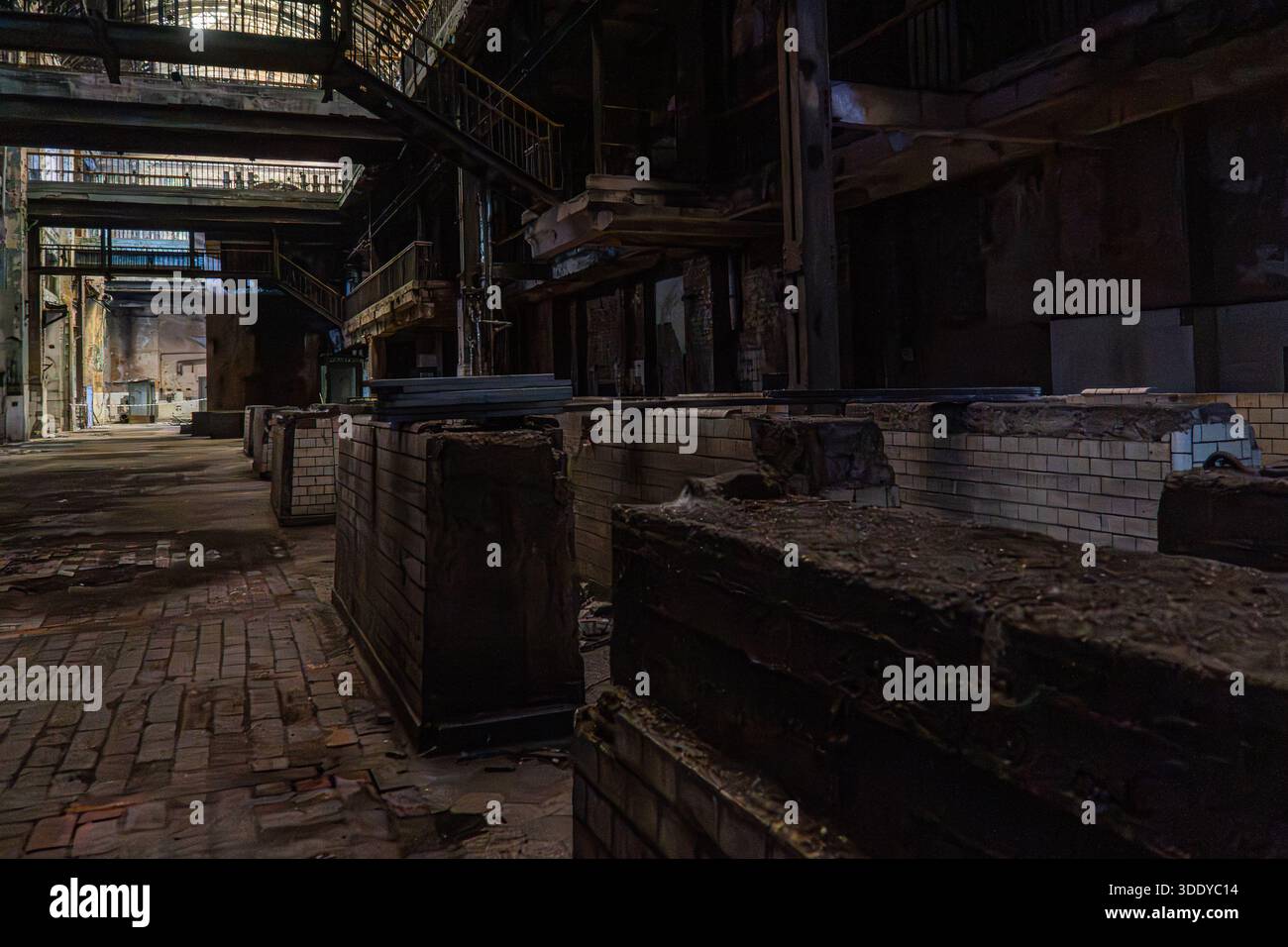 Factory Signs Defect Rework Area Interior of abandoned factory showing brick industrial structures and ...