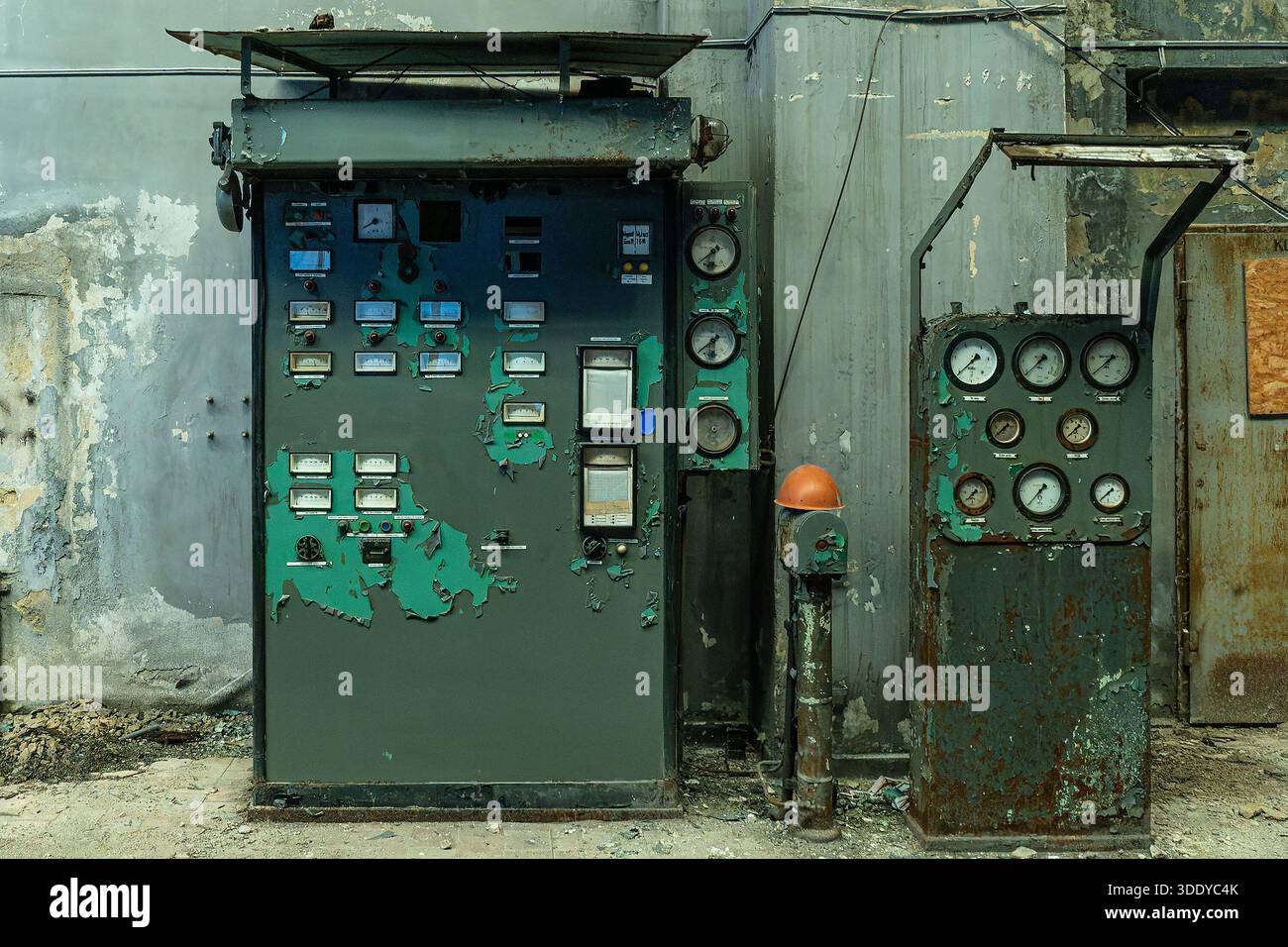 Old abandoned industrial control panel with analog gauges meters and ...