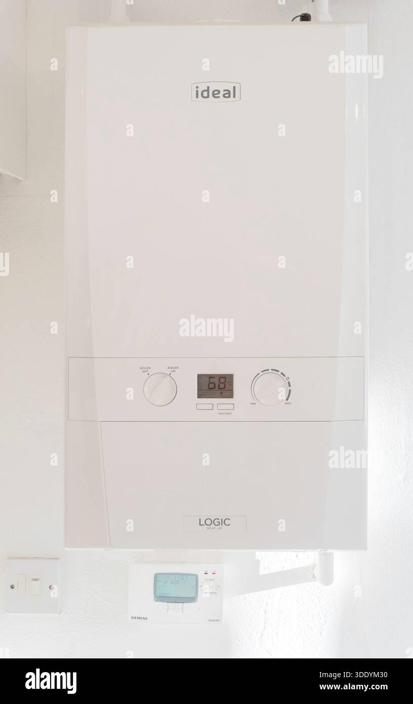 Ideal Logic gas boiler in a domestic kitchen Stock Photo