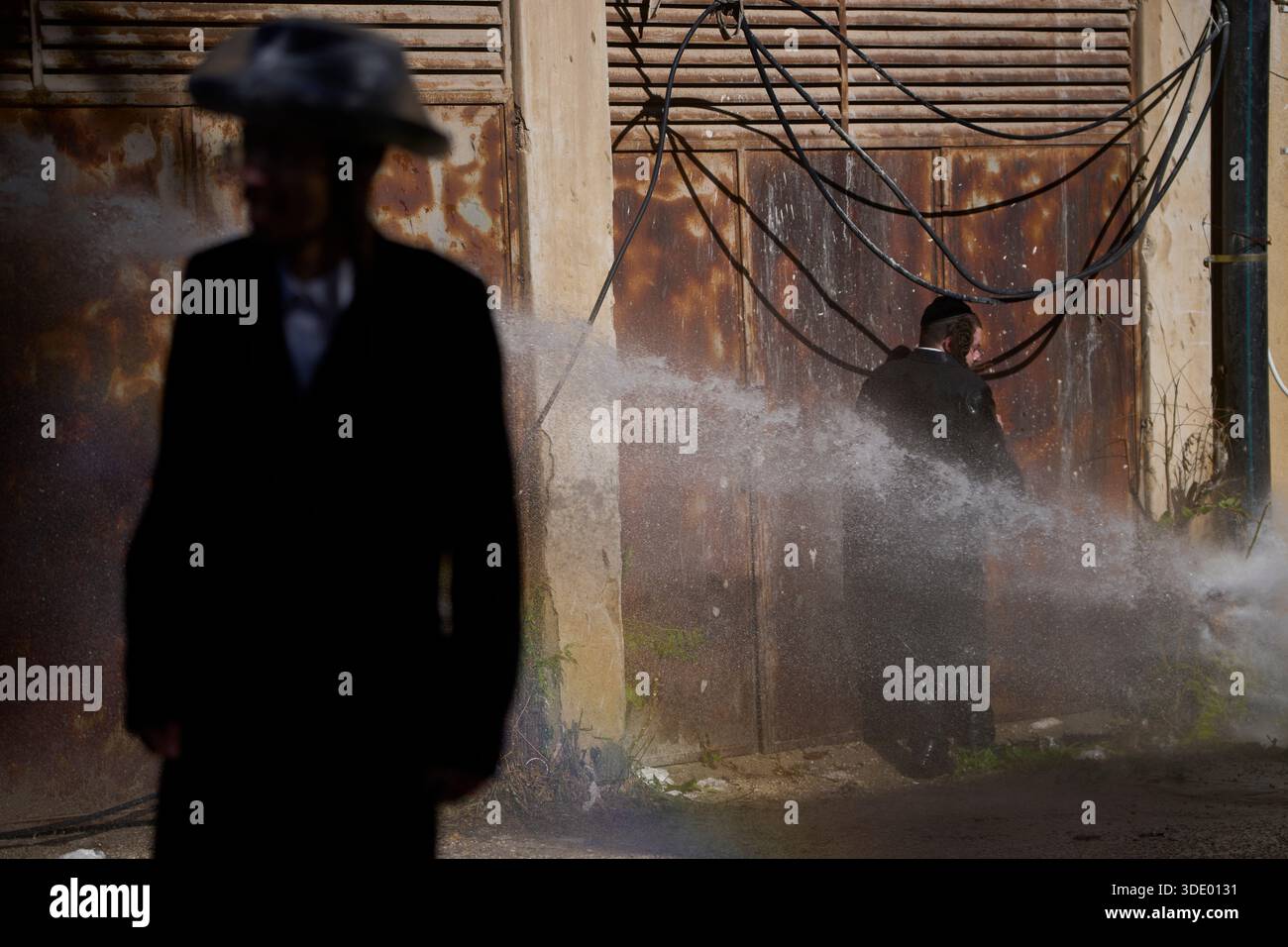Police use water cannon to disperse ultra-Orthodox Jewish men blocking ...