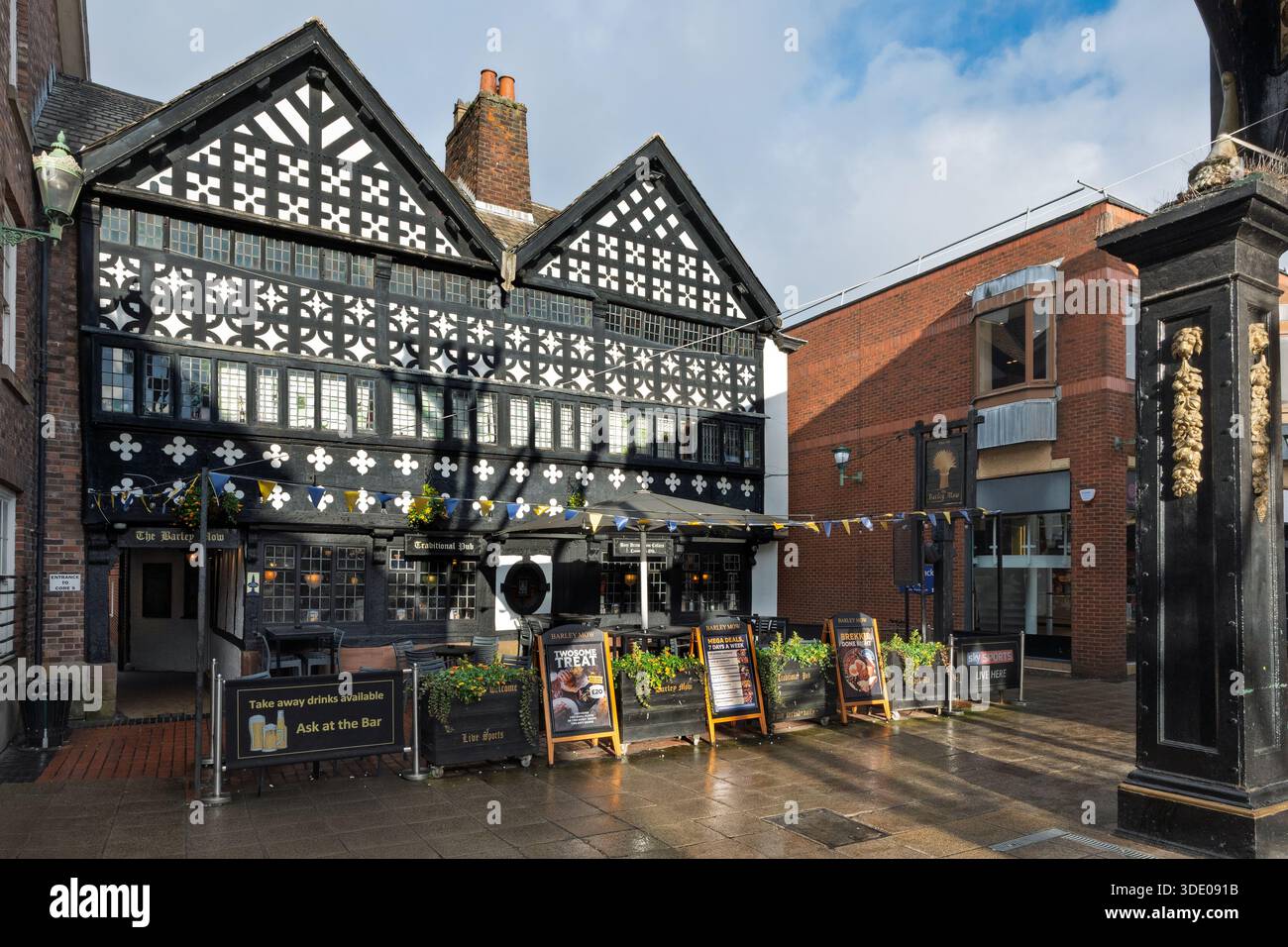 The Barley Mow public house established in 1561, The Barley Mow, in Golden Square, is one of the oldest pubs in the Warrington. Tudor balck and white Stock Photo