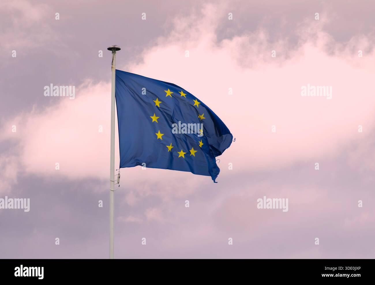 European Union flag fluttering on flagpole Stock Photo