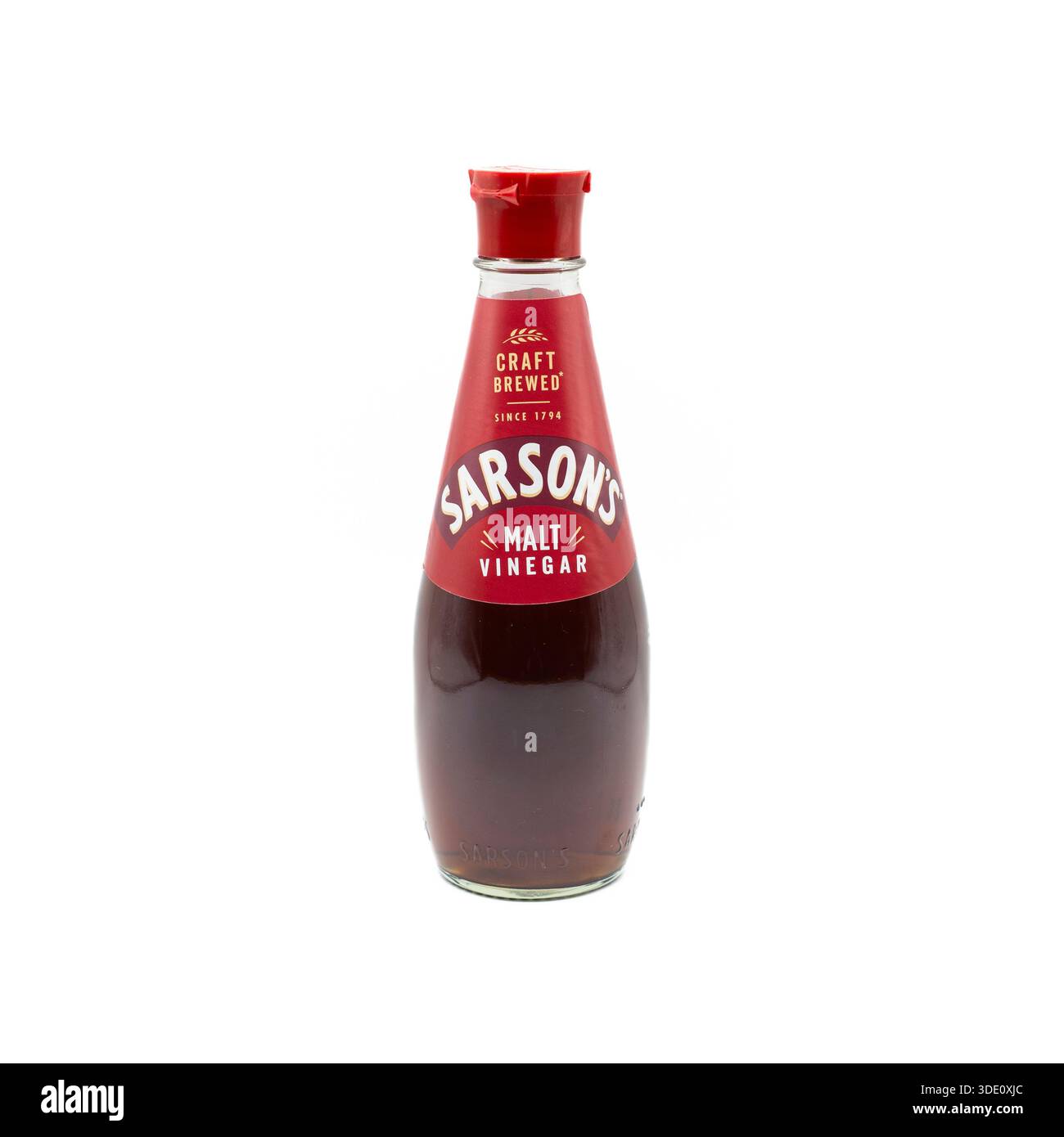 Sarsons malt vinegar bottle in its distinctive pear shaped glass bottle, craft brewed acetic acid, currently owned by Japanese company Mizkan. UK Stock Photo