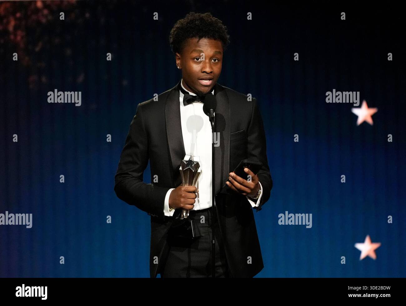 Miles Caton accepts the award for best young actor/actress for 
