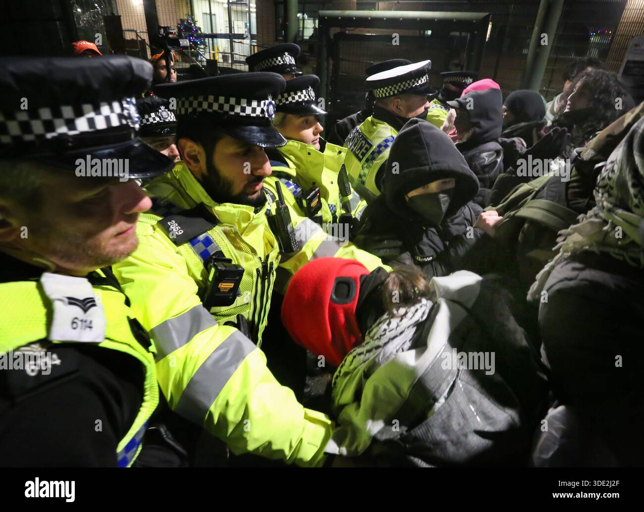 Hmp Risley Strike Police officers and protesters push one another during the ...
