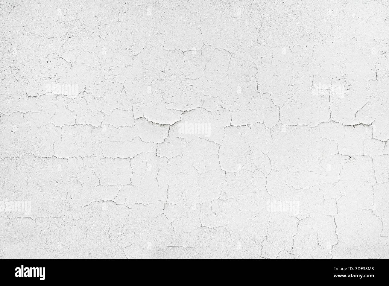 White peeling paint on old wall cracked texture as background Stock Photo