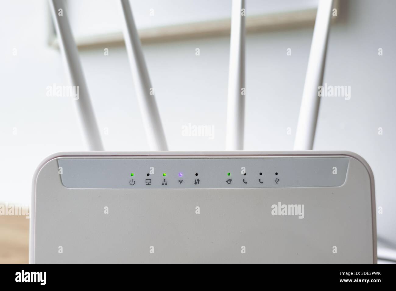white WIFI internet router close-up in a room or office Stock Photo