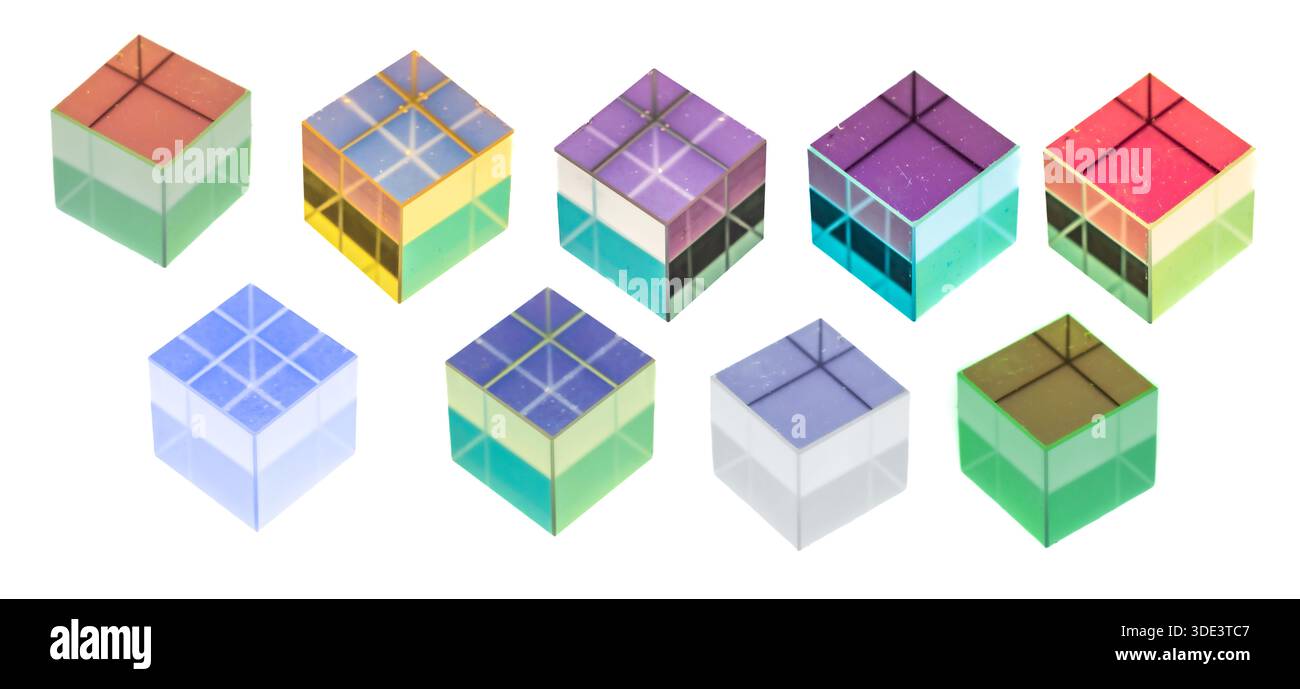 a transparent, three-dimensional cube with a rainbow gradient. The cube has a glass-like texture with subtle reflections and refractions, giving it a Stock Photo