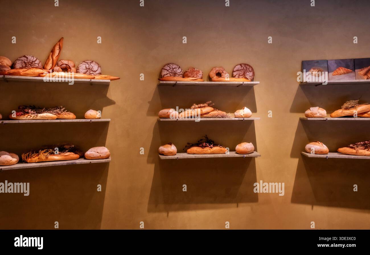 Bread Display Design The image displays a stylish, minimalist bakery display featuring ...