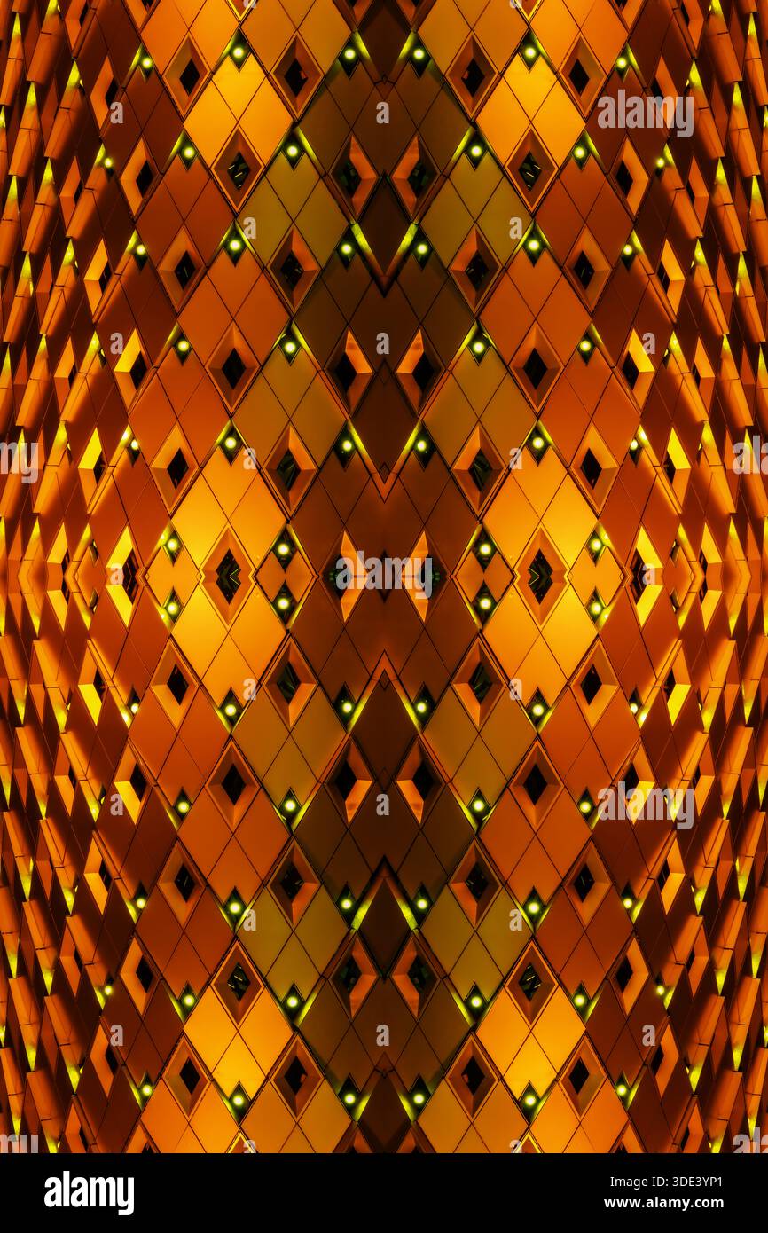 geometric, metallic surface featuring a grid pattern of square tiles. The tiles are illuminated with vibrant lighting, creating a dynamic, abstract an Stock Photo