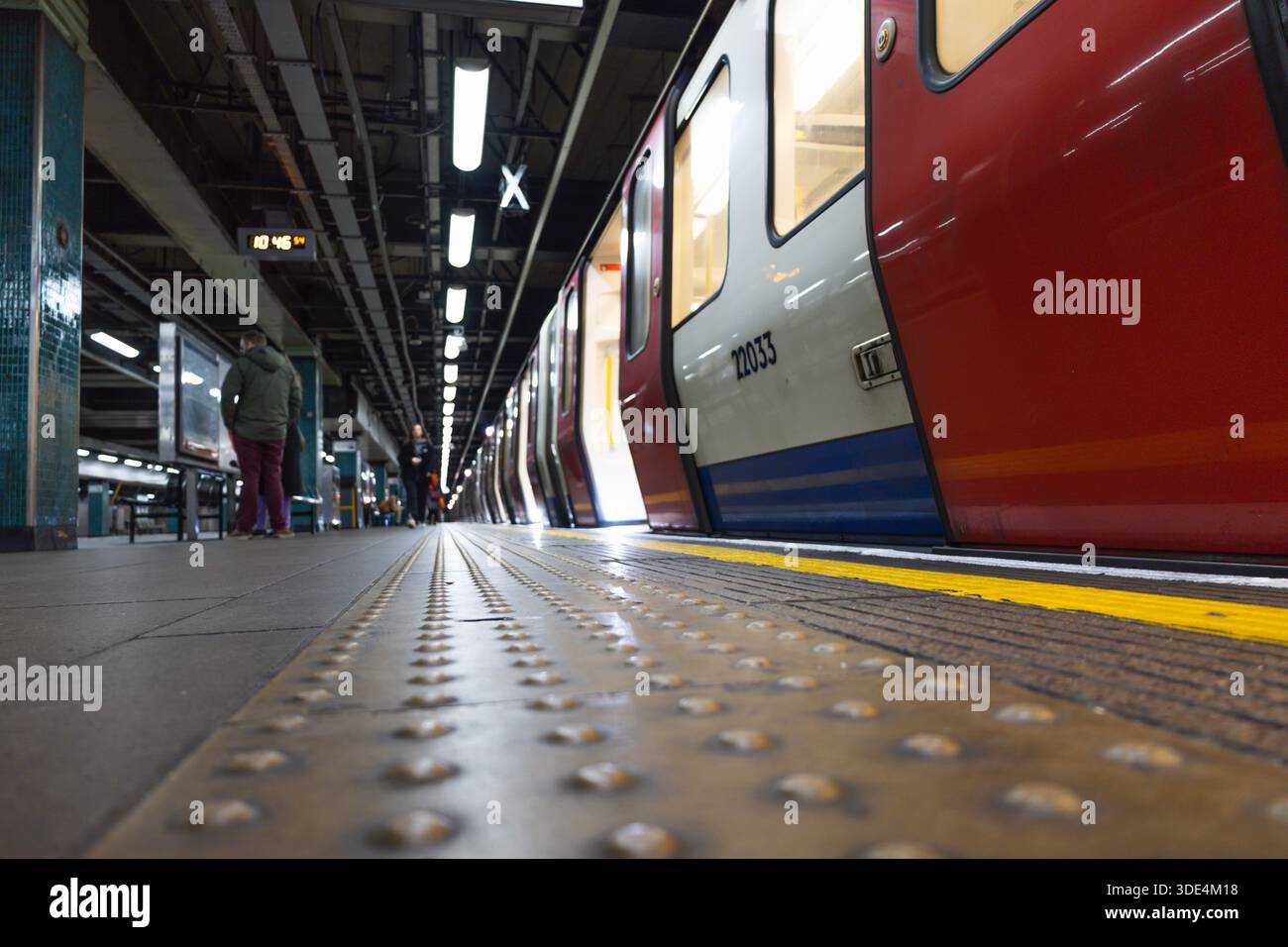 London Underground Tube Station Platform with Yellow Tactile Paving. London, UK, 3 March 2024 Stock Photo