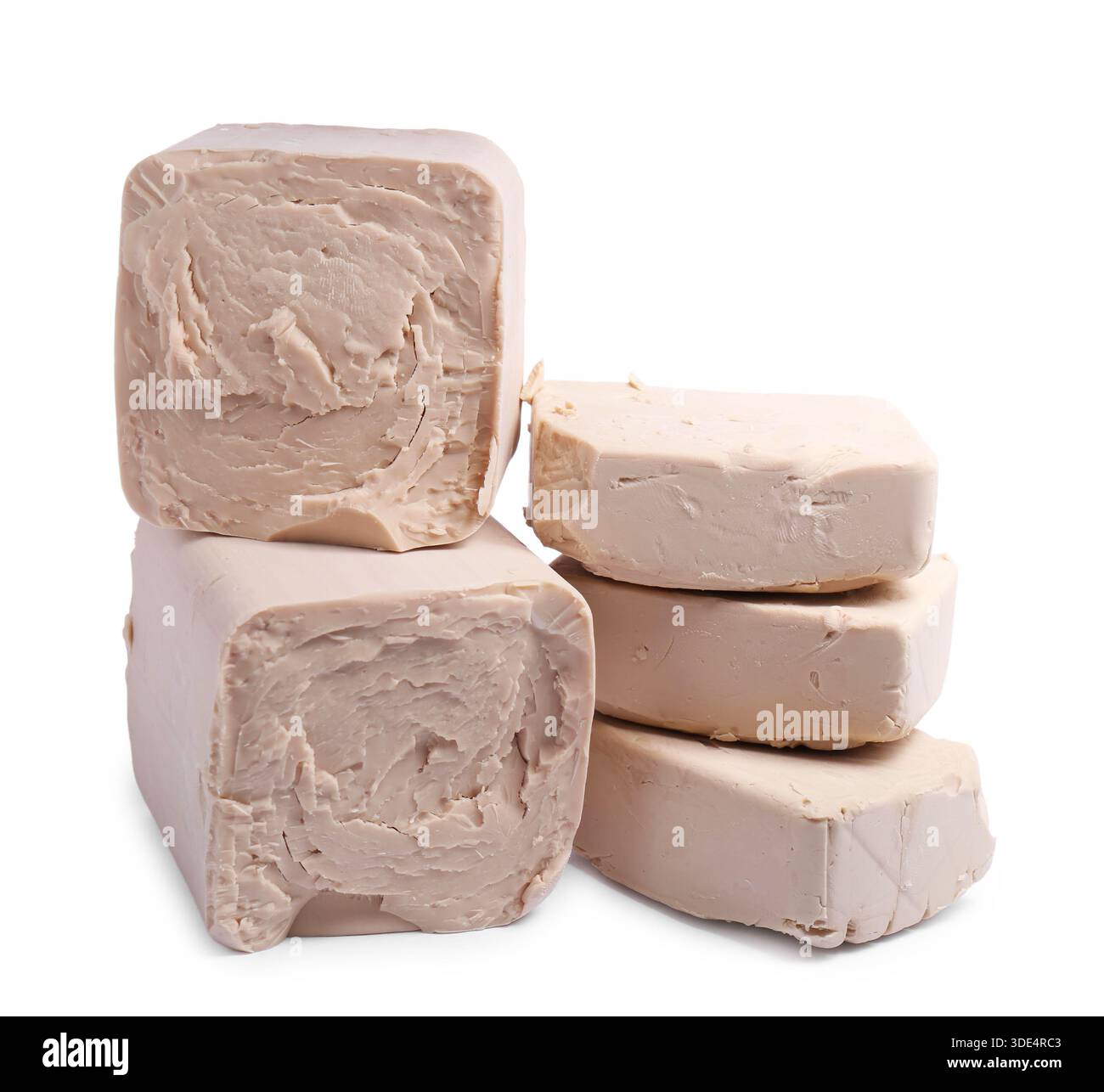 Blocks of compressed yeast on white background Stock Photo
