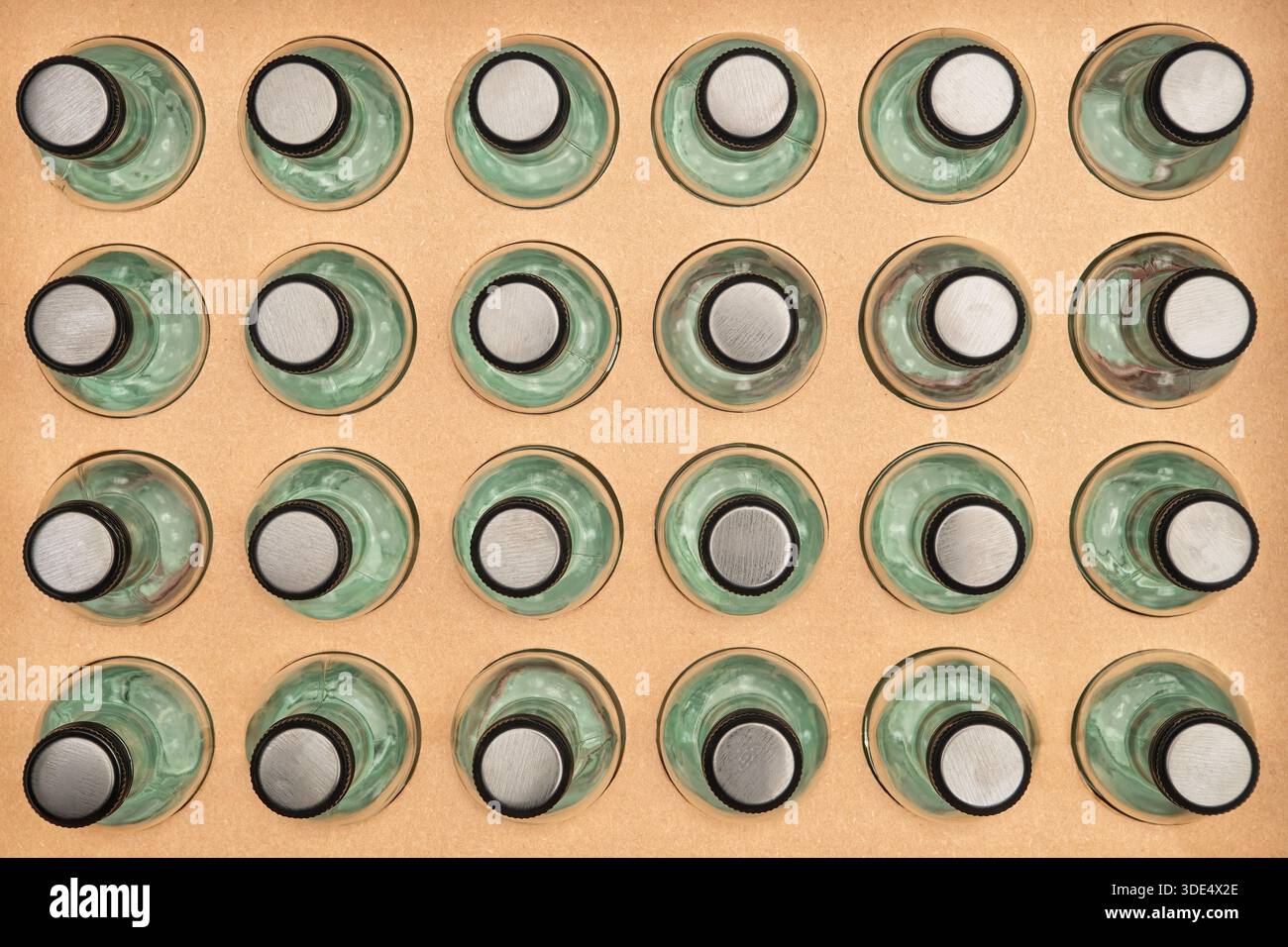 Looking Straight Down on a Case of Wine Bottlels as Absrtact Art Stock Photo