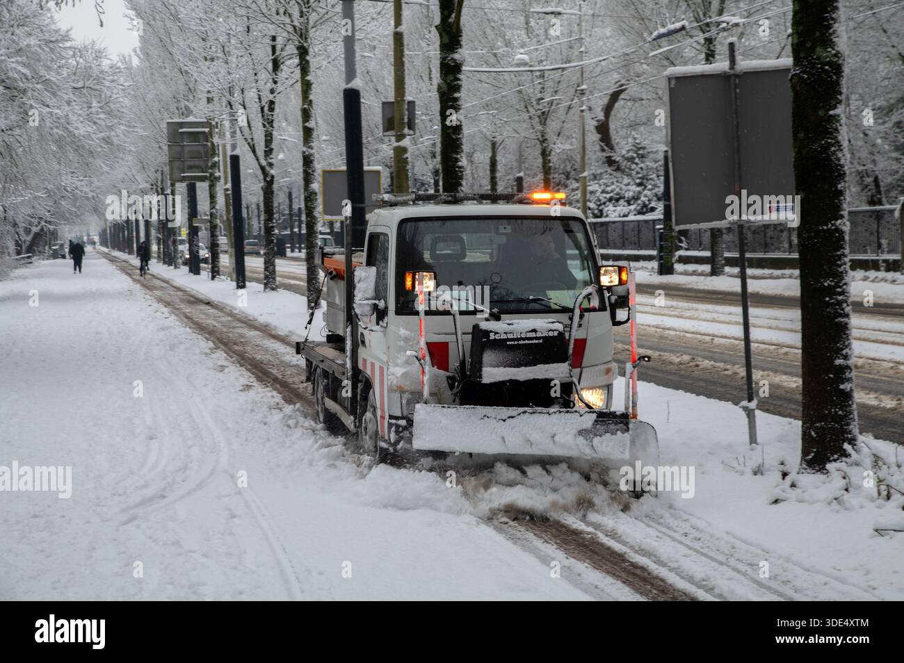 A Snowplow Under Snow At Amsterdam The Netherlands 5-1-2026 Stock Photo