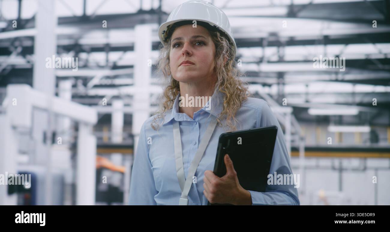 Woman in Safety Helmet Conducts Audit, Swiping Screen of Handheld ...
