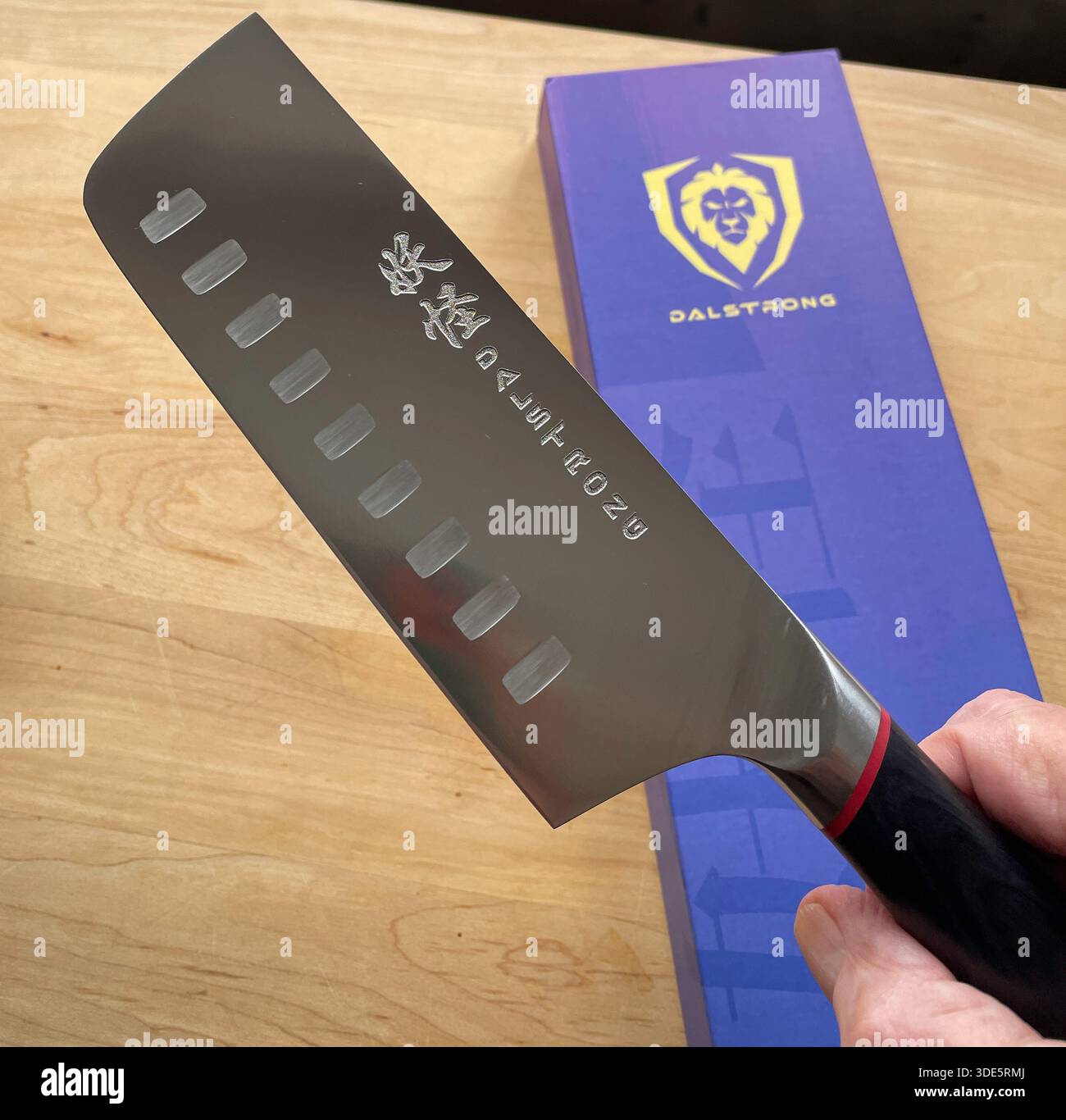 Dalstrong sells a premium Japanese ultra expensive vegetable knife that is an amazing culinary tool, 2025 - Smartphone Captured Stock Image