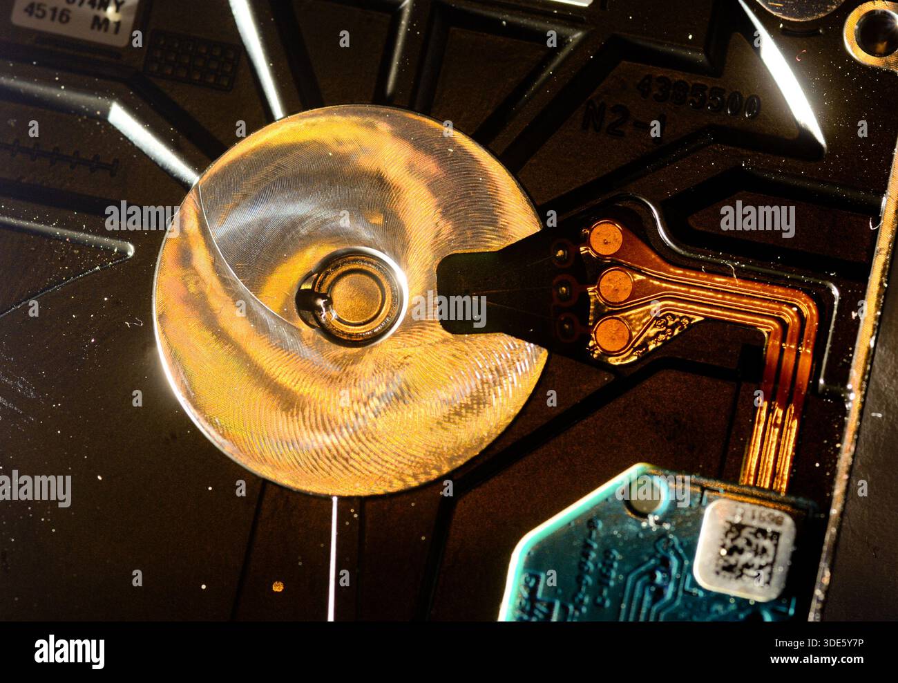 A damaged hard drive from an Apple computer. Stock Photo