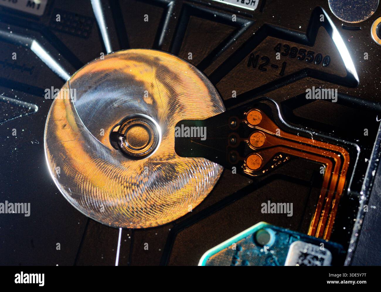 A damaged hard drive from an Apple computer. Stock Photo