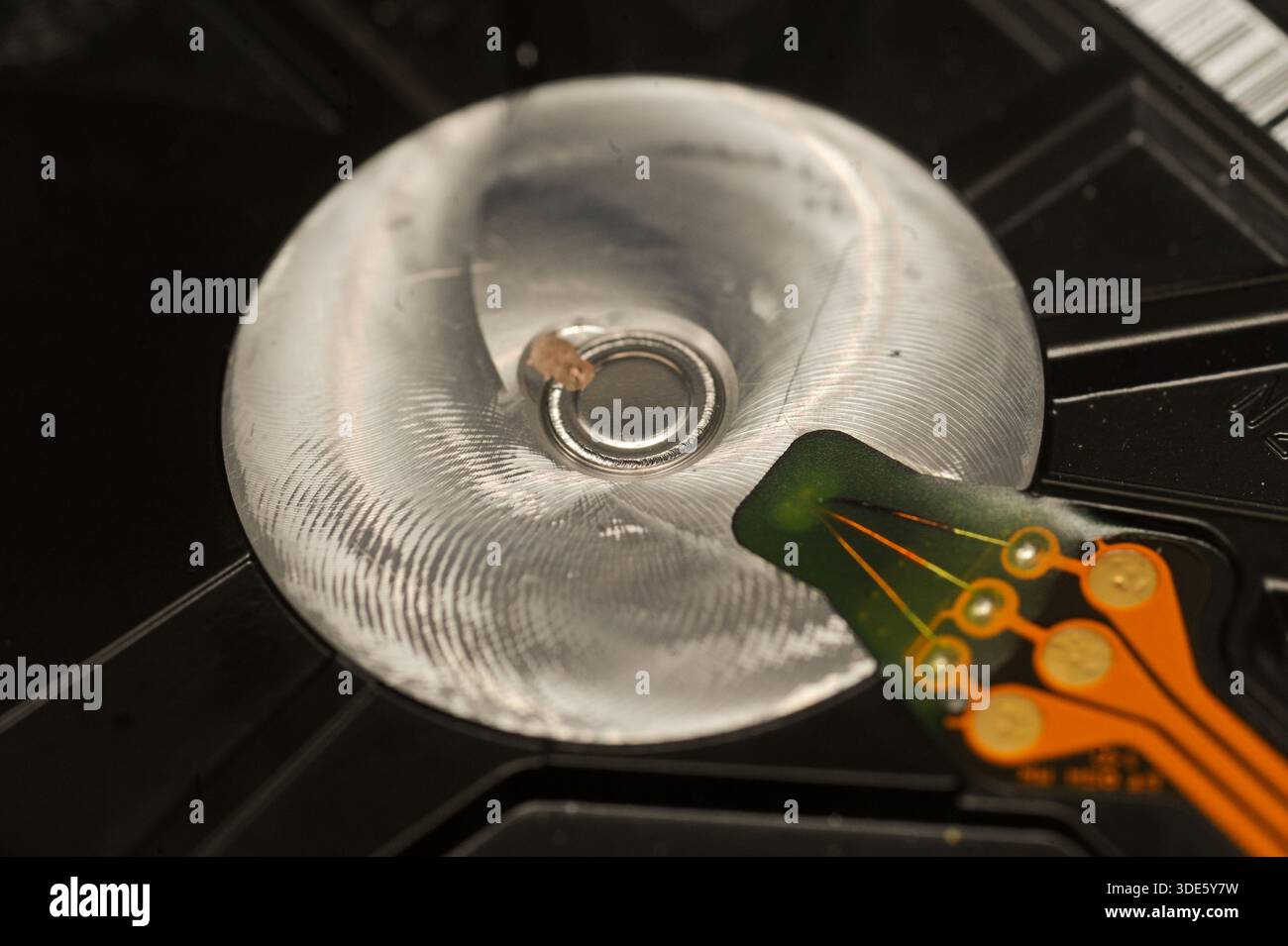 A damaged hard drive from an Apple computer. Stock Photo