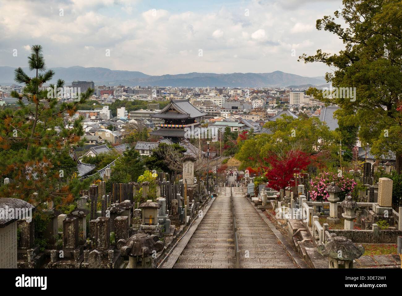 A pathway winds through a historic cemetery at Konkai Komyo-ji Temple ...