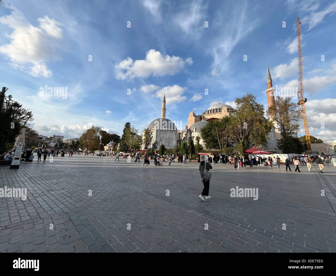 ISTANBUL, TURKEY - SEPTEMBER 25: Tourist walking at Sultanahmet Square ...