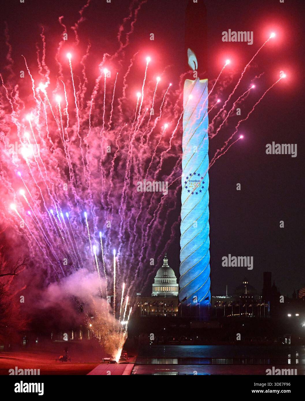 Fireworks erupt behind the Washington Monument during the United States