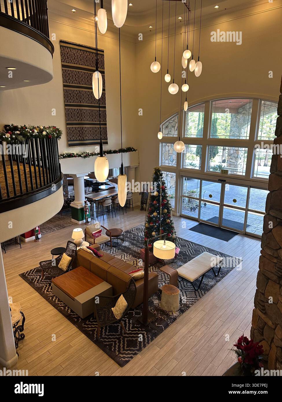 High-Angle View of a Luxury Hotel Lobby with Christmas Tree - Smartphone Captured Stock Image