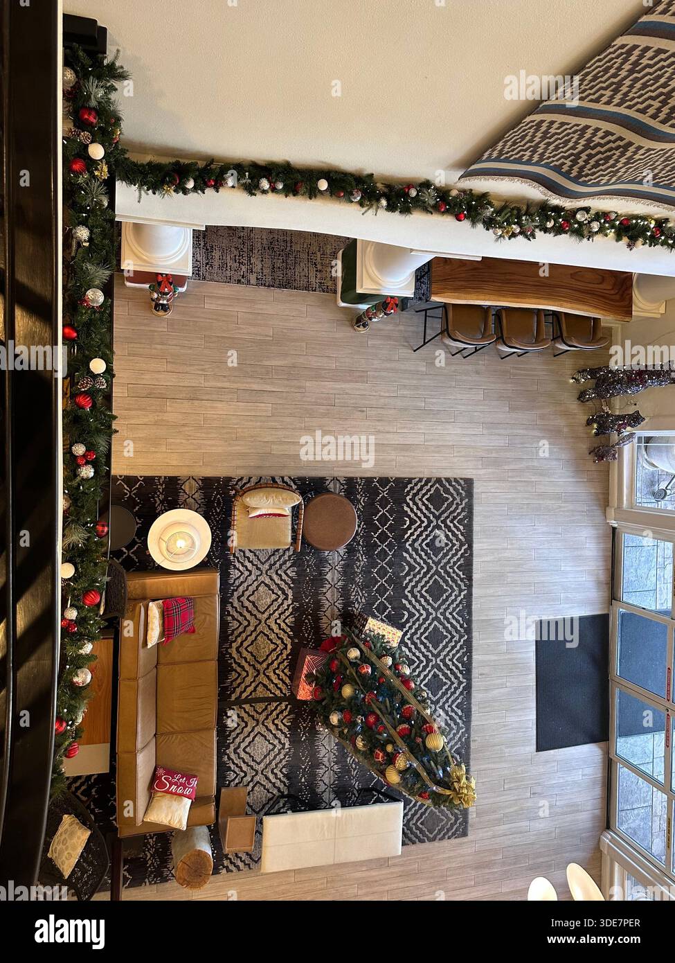 High-Angle View of a Luxury Hotel Lobby with Christmas Tree - Smartphone Captured Stock Image