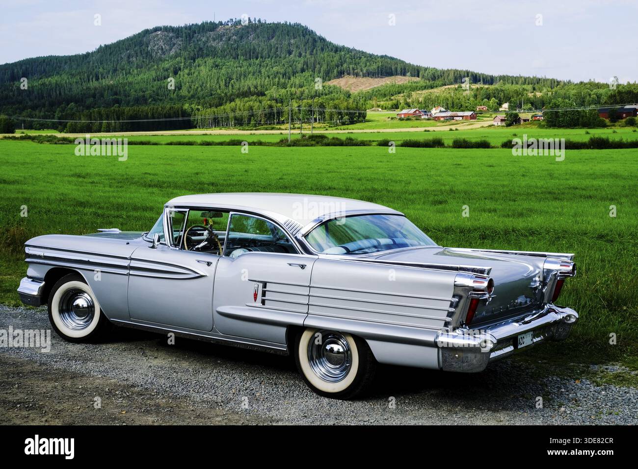 American classic car, Oldsmobile 98 Custom from 1958, silver with 