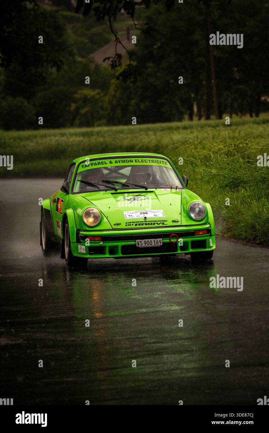 Switzerland Rally Racing Classic sports car racing on an alpine road during a historic rally ...