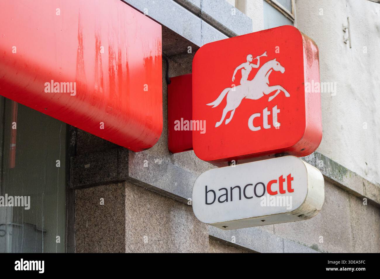 Ctt and banco ctt logos displaying on signs attached to a building ...