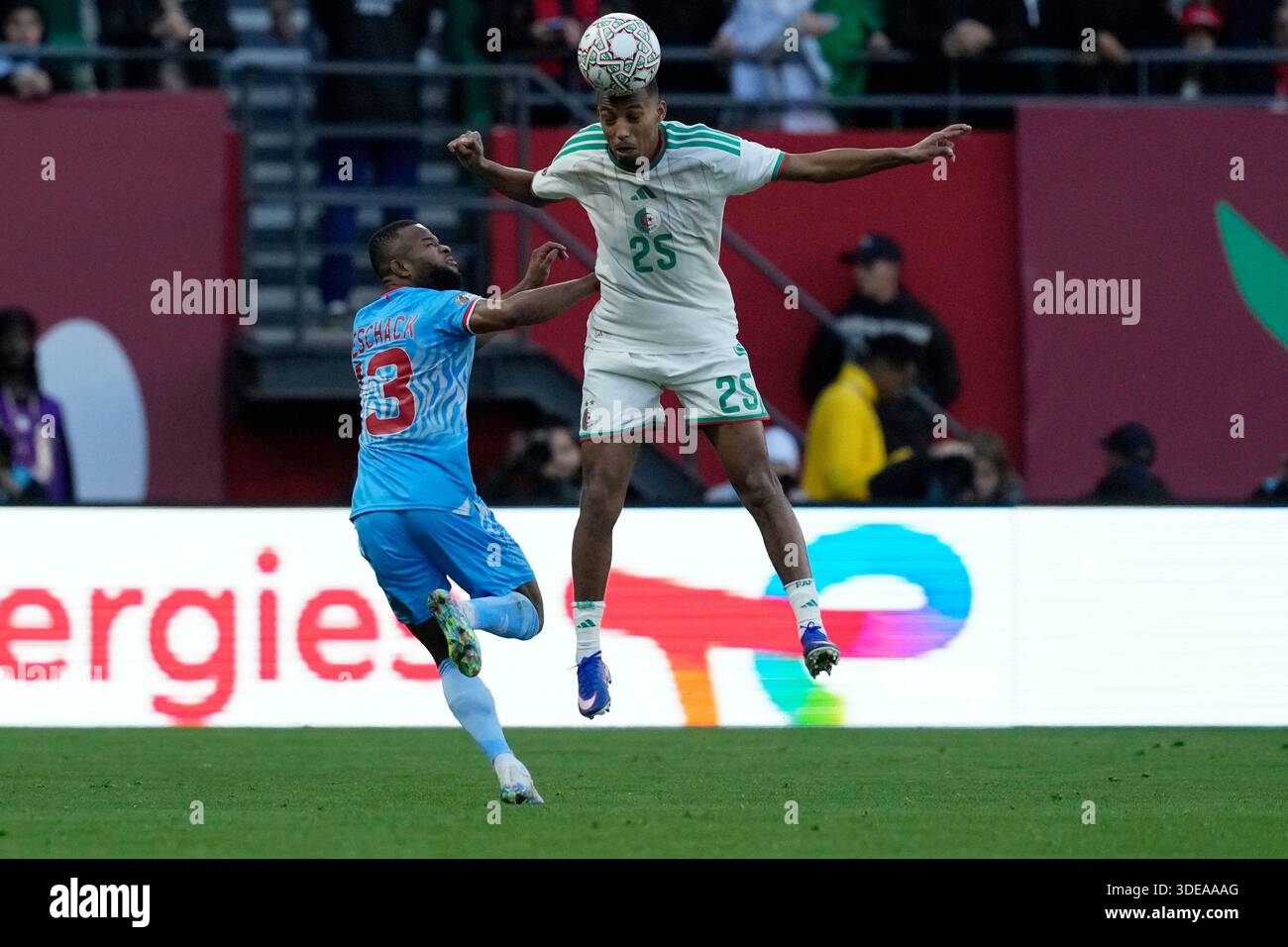 Mo Rafik Algeria's Rafik Belghali, right, heads the ball as DR Congo's Meschack ...