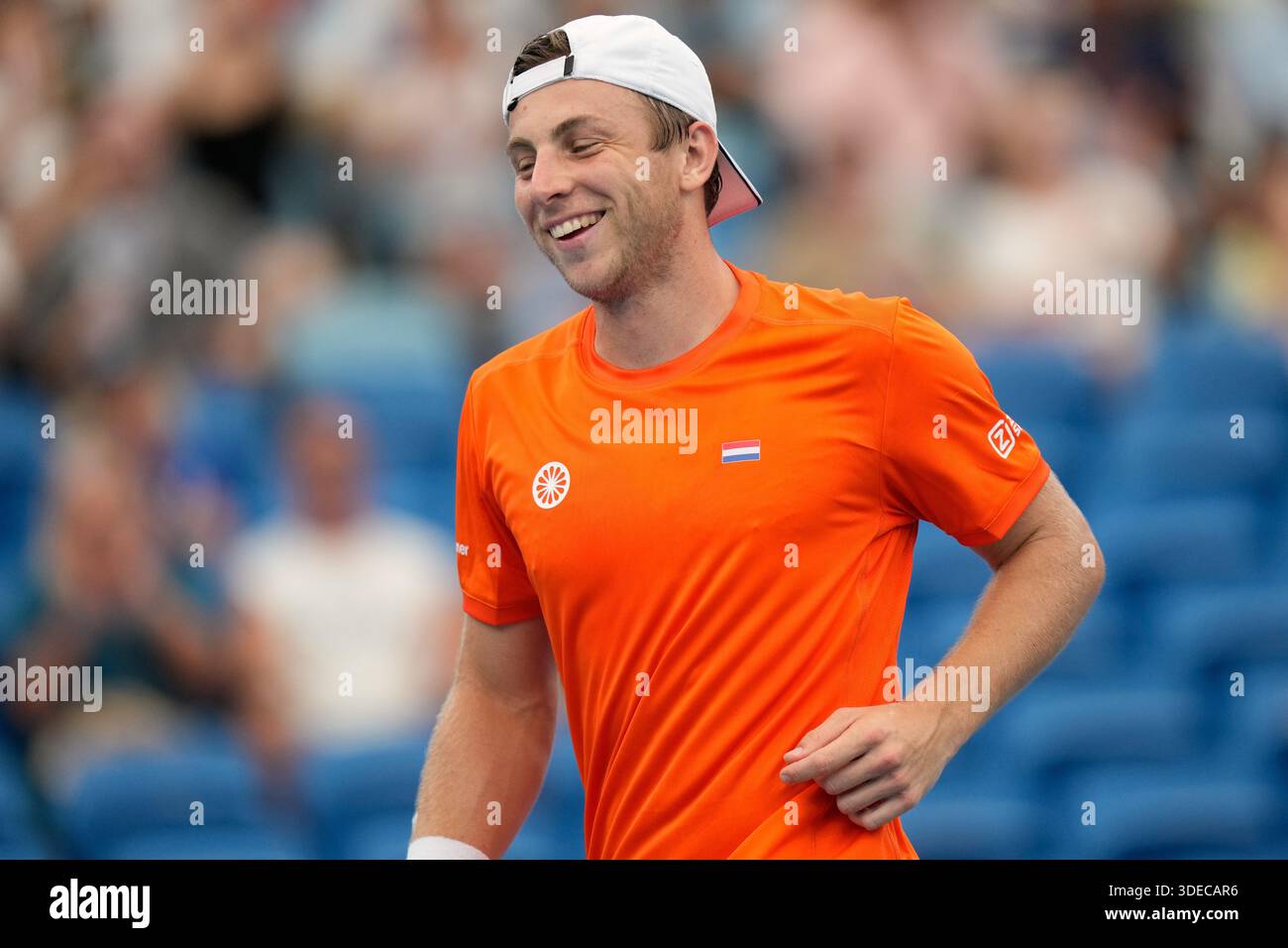 Tallon Griekspoor of Netherlands smiles after playing a shot to Hubert ...
